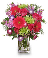 Send some Seasonal Style with this wonderfully festive Holiday Vased Flower Arrangement